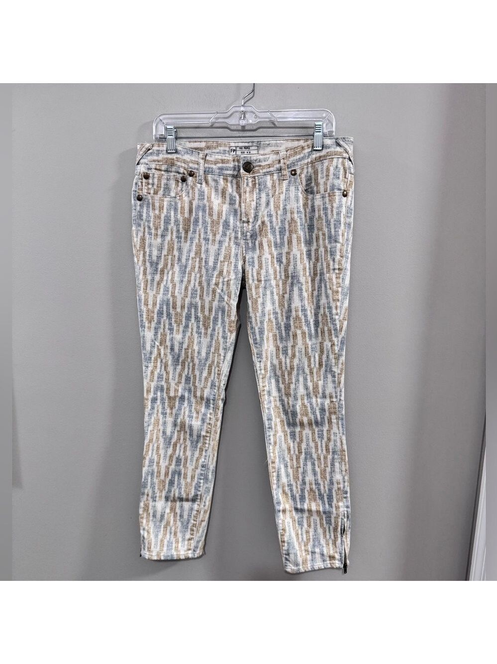 Women's Free People Tan and Gray Ankle Cropped Jeans with Aztec Pattern. Size 31